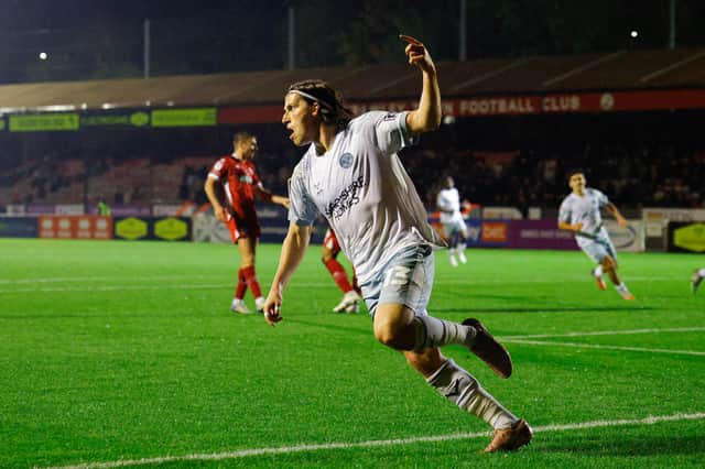 Shrewsbury's Josh Davison celebrates for 1-1 at Crawley