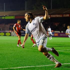 Shrewsbury's Josh Davison celebrates for 1-1 at Crawley