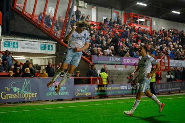 Josh Davison celebrates his stoppage-time winner
