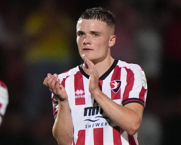 Freddie Willcox applauds the Cheltenham fans