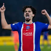Paris St Germain's Vitinha celebrates his goal against Barcelona