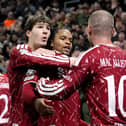 Liverpool’s Alexis Mac Allister (right) celebrates celebrates scoring their side’s third goal of the game with teammate Rio Ngumoha