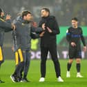 Cesar Peixoto and John Mousinho have words