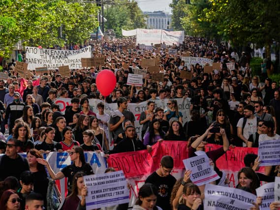 Protesters take part in a rally in Athens, Greece
