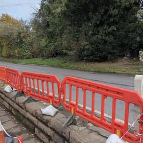 The damaged railings outside the Punch Bowl