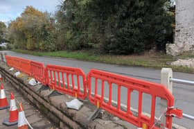 The damaged railings outside the Punch Bowl