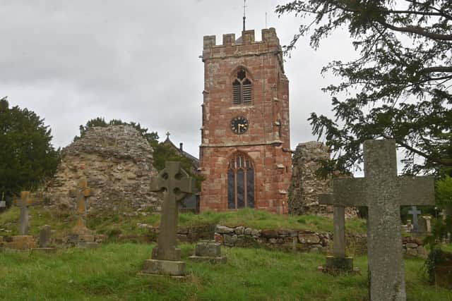 The castle ruins in the grounds of the St John the Baptist Church