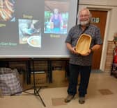 Phil with one of the bowls made by one of the people taking part in the wood work class. 