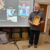 Phil with one of the bowls made by one of the people taking part in the wood work class. 
