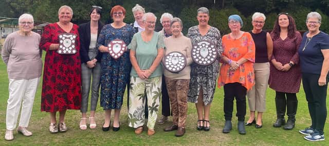Pictured (from left): Jan Hetherington (Chelmarsh captain, third in div 2), Helen Clee (Edgmond, Champion of Champions winner), Georgia Rawlins and Louise Cotton ( Bowring, Grace Howells Doubles winners), Verena Swinnerton and Jane Wherton (Worfield, loosing semi finalists in the doubles), Sylvia Shotton (St Georges, div 2 average winner), Heather Carwardine (St Georges captain, div 2 winners), Carol Faulkner (Bowring captain, div 1 winners), Donna Larke (Charlton, div 1 averages winner), Amanda Hardman and Lisa Wilson (SJB A, loosing finalists in the doubles), Gill Baker (SJB B, div 2 runners up).