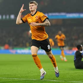 Jordan James celebrates scoring for Wolves against Portsmouth on Tuesday