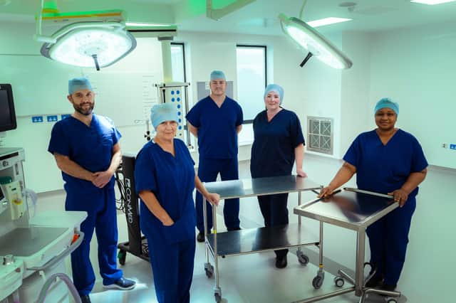 In the new operating theatre at The Robert Jones and Agnes Hunt Orthopaedic Hospital: David Blackwell, Senior ODP Theatre Manager; Jan Maychild, Theatre Support Worker; Nick Mullis, Operating Department Orderly; Emma Thomas, Nurse & AHP Clinical Lead, Theatres; and Yetunde Peluola, Scrub Theatre Practitioner