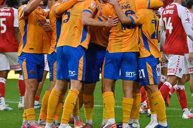 Shrewsbury Town celebrate their third goal in the 3-3 draw before being pegged back.