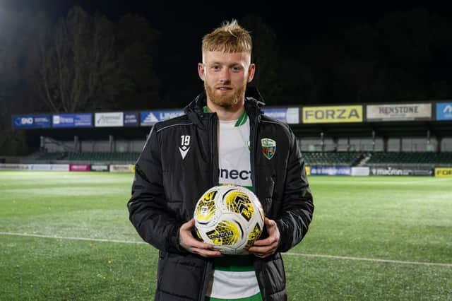 Brad Young with the match ball after The New Saints' 9-0 victory over Ammanford