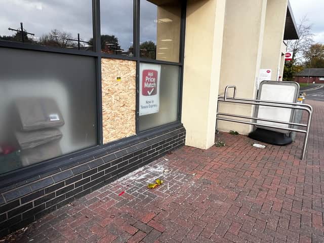 Shattered glass outside Tesco in Hadley, Telford