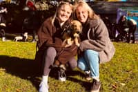Lauren and Lisa Neal, from Shrewsbury, give Otis a cuddle