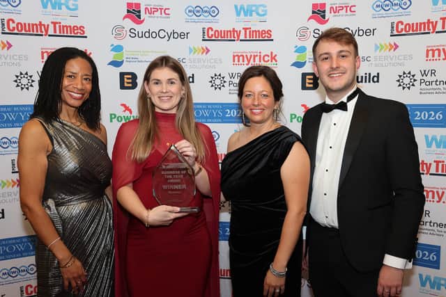 Rachel Jones and Lisa Andrew from Morland  (centre) receive the Powys Business of the Year Award from Sherrie Woolf of sponsor SudoCyber and Cllr Glyn Preston