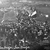 Huge crowds at the opening of the Free Bridge in 1909, with the mysterious tent seen top right.