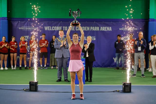 Hannah Klugman lifts the trophy after being crowned Lexus Wrexham Open champion