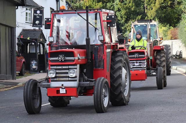 Edward Godsell and Jack Phillips behind with their MF 135s