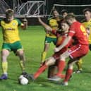 Players get stuck in during Radnor Valley's victory over Llanidloes Town