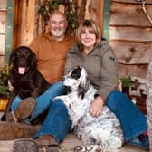 Steph and Paul Macdonald with Sylvie and Wren outside Quabbs Cabin.