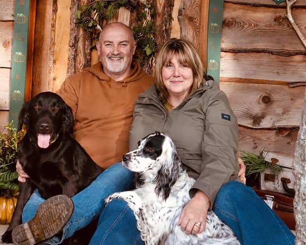Steph and Paul Macdonald with Sylvie and Wren outside Quabbs Cabin.