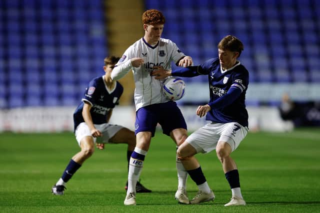 Ceiran Loney of Everton U21 and Jay Turner-Cooke of Shrewsbury Town
