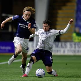 Hugo Aiston of Shrewsbury Town and Shea Pita of Eveton Under 21