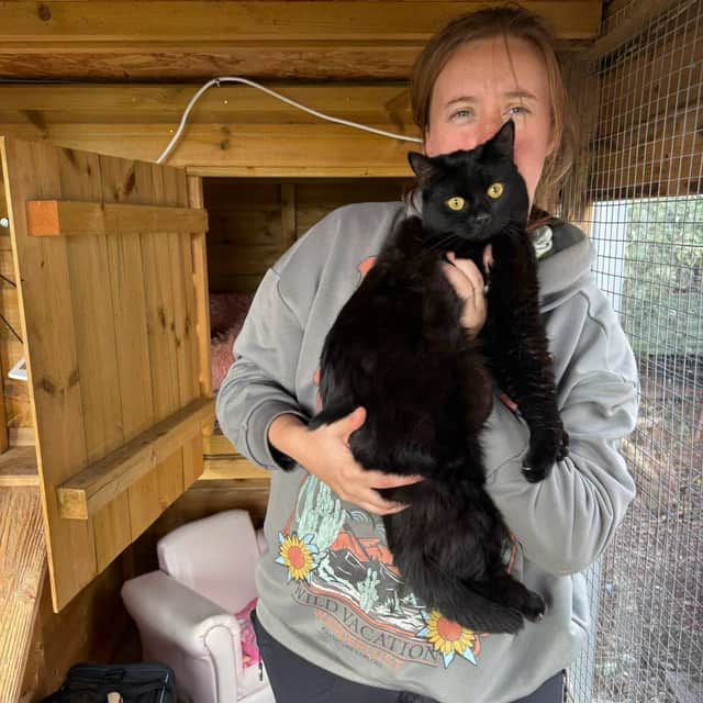 A member of the rescue team with Nibbles