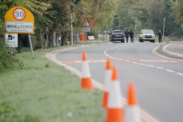 Police attended, located three white vans and five men, who were arrested (PA)
