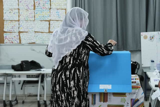 Opinion polls have suggested a tight race (Mahmoud Illean/AP)