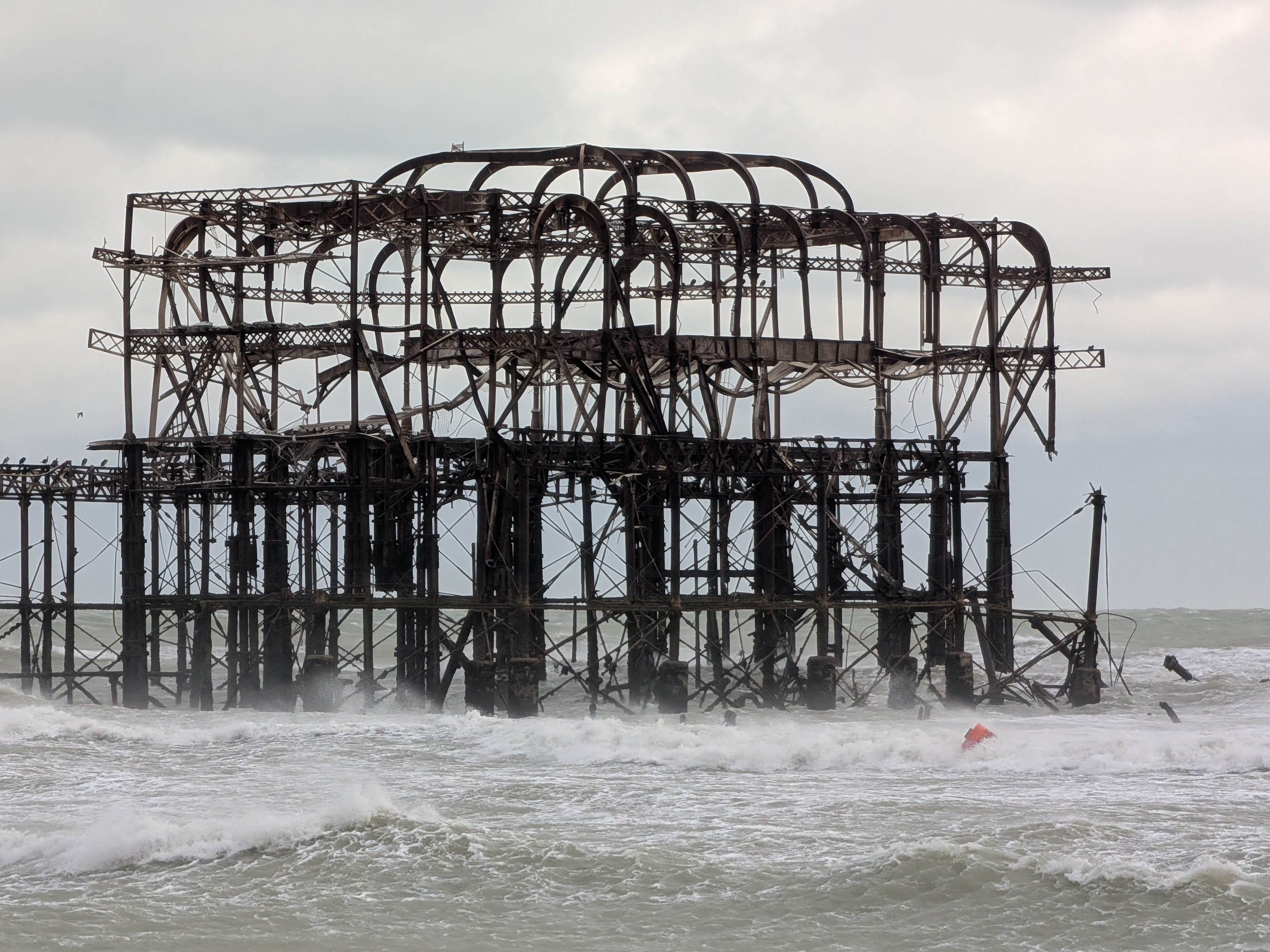 Part of historic Brighton pier collapses as storms bring heavy disruption