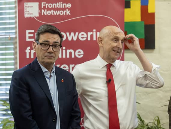 Prime Minister Andy Burnham and Chancellor of the Exchequer John Healey during a visit at St Martin-in-the-fields, a homeless charity in central London,
