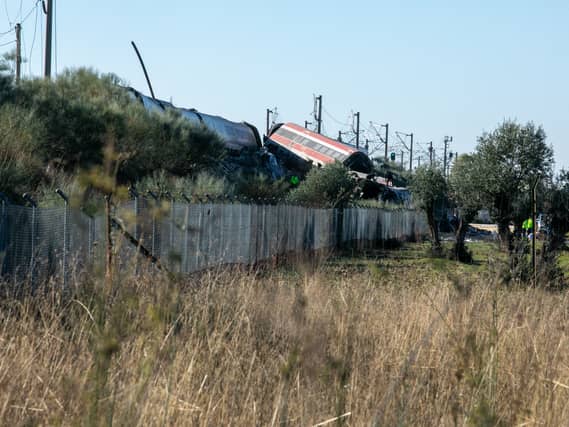 The mangled wreckage of two trains