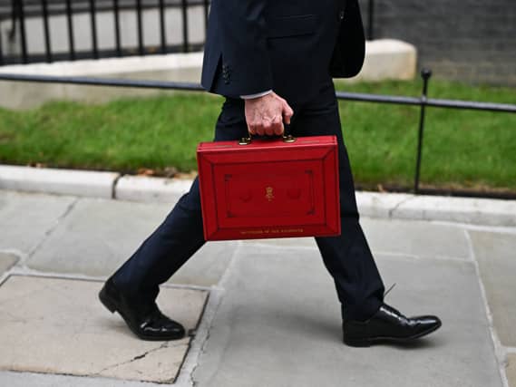 John Healey walking down Downing Street carrying his ministerial red box