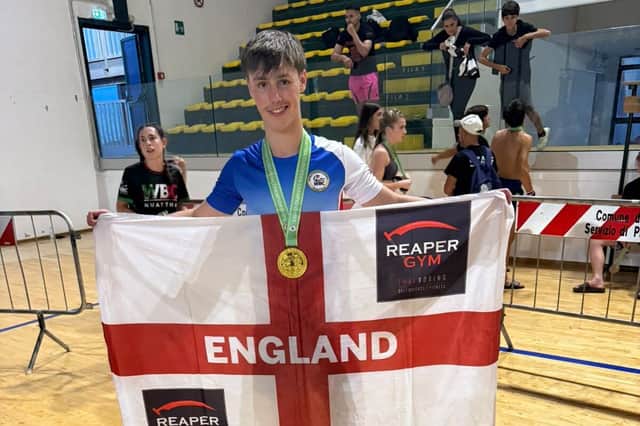 Arthur Latham with his gold medal after winning the WBC European Championships.