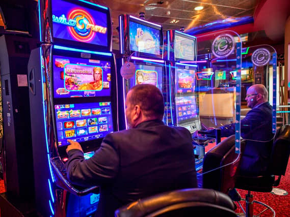 People playing gambling machines