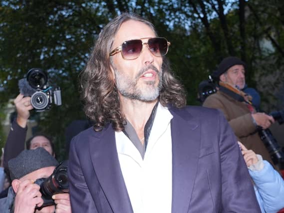Russell Brand departing court