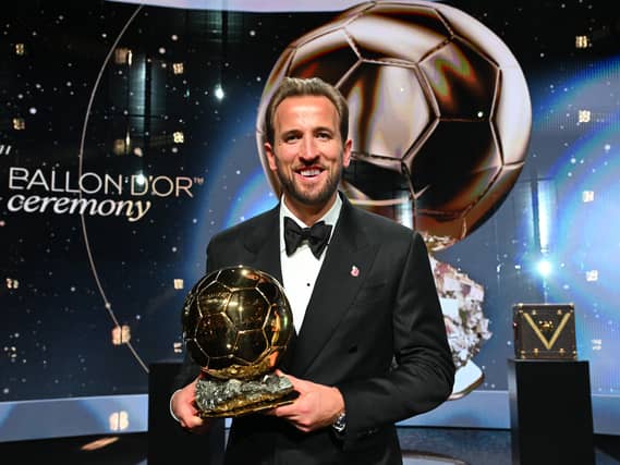 Harry Kane pictured with the Ballon d'Or trophy at the London Palladium