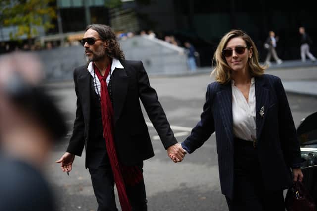 Russell Brand and his wife Laura arriving at Southwark Crown Court on Thursday (Jordan Pettitt/PA)
