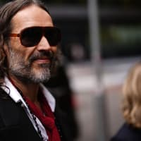 Russell Brand’s wife hails ‘kind’ husband but tells court he cheated when dating