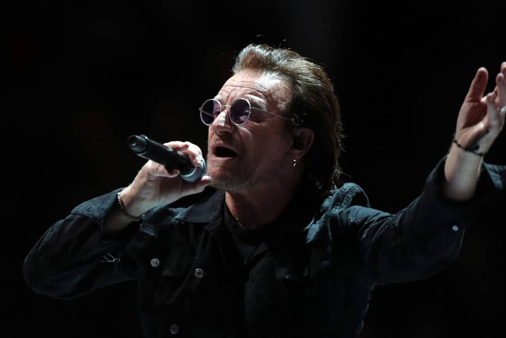 Bono performing on stage