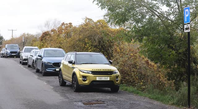 A long layby to the side of Cluddley Lane has been retained for free car parking spaces