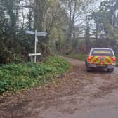 Police at the east end of Sheep Walk Lane near Kinver where a burnt-out car with a body inside was found