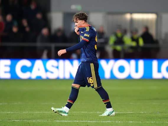 Max Dowman leaves the field after being sent off for Arsenal at Fleetwood