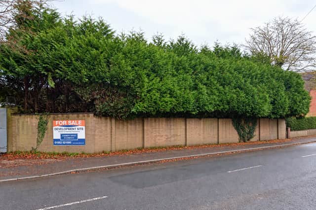 The site was overgrown and neglected (view from Victoria Road before the development)