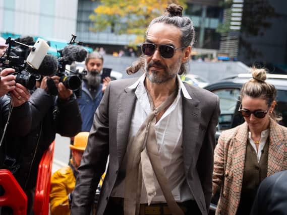 Russell Brand arrives at court