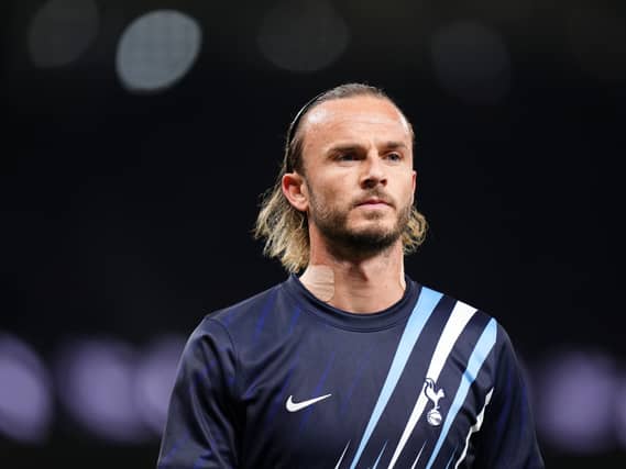 James Maddison looks on