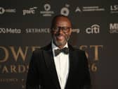 Ian Thomas smiling at a gala event
